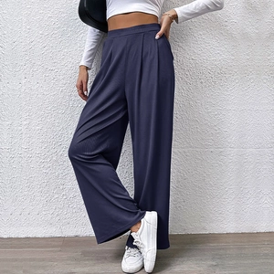 Women's dark purple high waist wide leg knit pants with ribbed texture and elastic band