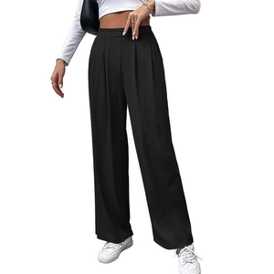 Women's black high-waisted wide-leg knit trousers with elastic waist and ribbed texture