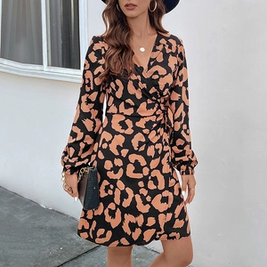 Women's V-neck leopard print wrap mini dress with long puff sleeves and waist tie detail