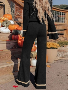 Women's black V-neck knit set with flare sleeves and high-waist wide-leg pants