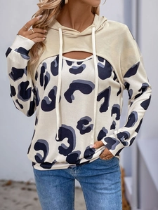 Detail of leopard print stitching and drawstring hood on high-quality fabric hoodie