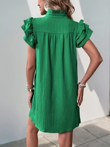 Back view of a green dress featuring elastic stand collar and ruffled flutter sleeves