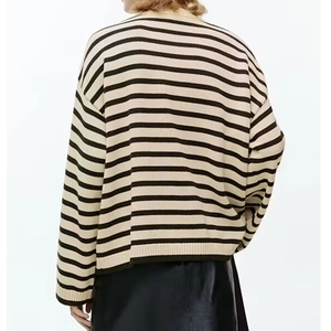 Women's oversized knit sweater with classic stripes and drop shoulder design