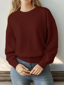 Detailed knit texture and ribbed cuffs of this burgundy crewneck heart sweater for women