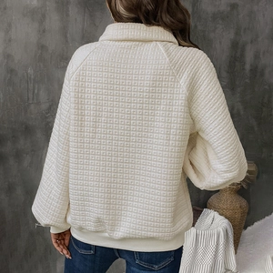 Women's ivory textured waffle knit quarter-zip sweatshirt with loose drop shoulder fit