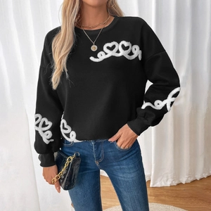 Women's black crewneck sweatshirt with white heart-shaped towel embroidery and ribbed cuffs