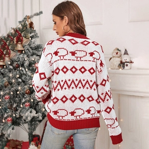 Women's knit Christmas sweater with lamb pattern and festive red and white patterns