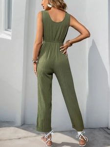 Detailed back view of olive green textured sleeveless jumpsuit showing waist design