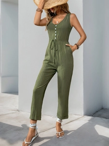 Detail of olive green sleeveless jumpsuit with ribbed texture and waist drawstring
