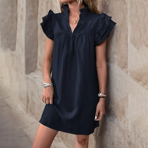 Navy blue textured summer dress with stand collar, V-neck, and layered ruffle sleeves