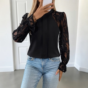 Elegant black long-sleeve lace patchwork blouse with a chic stand collar and ruffles