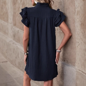 Dark textured mini dress featuring layered ruffle sleeves and a ruffled stand-up collar