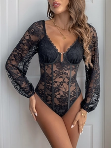 Close-up of black floral lace bodysuit with underwire V-neckline and sheer long sleeves