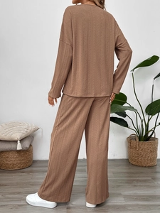 Back view of brown textured two-piece lounge set with long-sleeve top and wide-leg pants