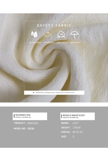 Détail de la texture douce du tissu respirant sur une robe décontractée blanche