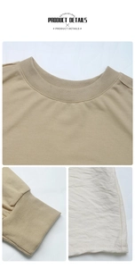 Détail macro d'un sweat à col rond kaki montrant l'encolure et les poignets côtelés