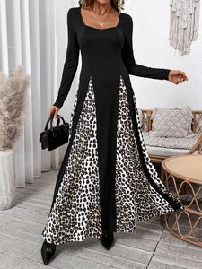 Detail view of long-sleeve dress with elegant leopard print patchwork and square neckline