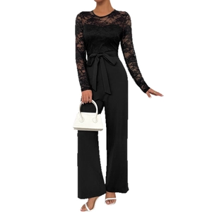 Elegant black lace patchwork jumpsuit with long sleeves, tie-waist and wide-leg design