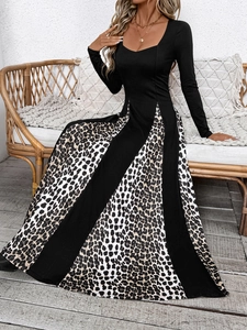 Detail of A-line maxi dress with leopard print paneling and heart-shaped neckline