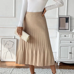 Elegant beige pleated knit midi skirt with high waist design for fall and winter style