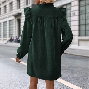 Dark green corduroy long sleeve dress with ruffle shoulders and smocked stand collar