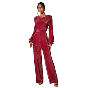 Elegant red glitter jumpsuit with long sleeves and wide-leg trousers for formal parties