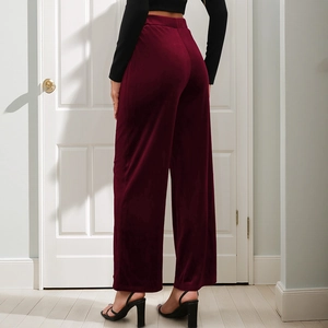 Elegant high-waisted burgundy velvet wide-leg trousers for women seen from back view