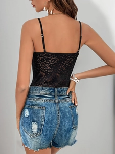 Detail view of lace bodysuit featuring adjustable spaghetti straps and back design