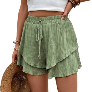 Groene casual shorts met hoge taille, ruches aan de zoom en verstelbaar koord