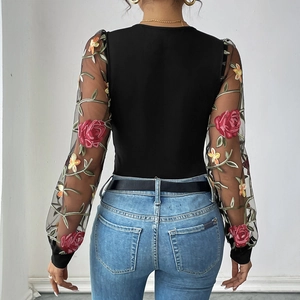 Women's black bodysuit featuring long sheer mesh sleeves with floral rose embroidery
