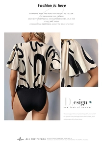 Detail of elegant bodysuit with geometric print and fluttering ruffles on sleeves