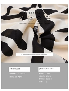 Detailed view of breathable bodysuit fabric with black and white geometric wave patterns