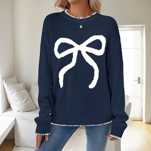 Navy blue knit sweater with white bow motif and contrast stitching details for women