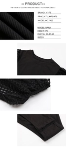Detail of ribbed black jumpsuit featuring mesh puff sleeves and round neckline