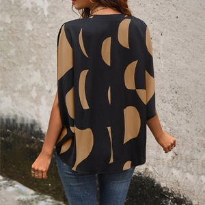 Loose fit V-neck short sleeve shirt with abstract geometric print in black and khaki
