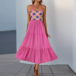Bohemian backless halter dress with colorful crochet bodice and hot pink tiered skirt