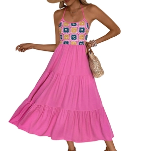 Hot pink halter neck dress with crochet bodice and tiered skirt for summer vacations
