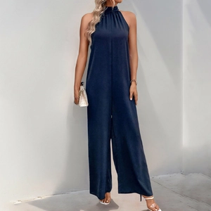 Elegante tuta intera blu scuro con scollo all'americana e gamba larga da donna