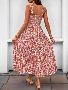 Detail of the back elastic smocked design and floral tiered maxi dress layers
