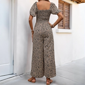 Floral print square neck jumpsuit with puff sleeves and wide leg back view design