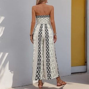 Detail of bohemian floral print on back of strapless wide-leg jumpsuit with geometric pattern
