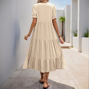 Elegant beige short sleeve A-line maxi dress with tiered ruffle hem and high waist silhouette
