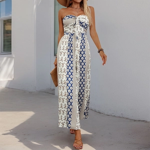 Detail of bohemian strapless jumpsuit with ethnic patterns and tie-knot chest detail