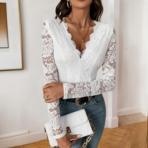 Slim fit white long sleeve lace bodysuit with deep V-neck and crochet floral sleeves