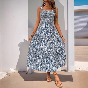 Floral print summer sundress with smocked bodice and tiered skirt for vacation style