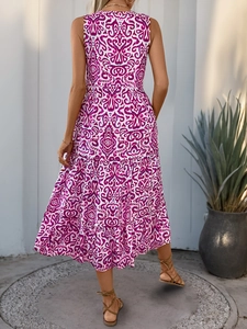Detail view of the bohemian purple and white printed sleeveless tiered midi dress