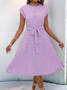 Detail view of purple geometric print pleated dress with adjustable waist tie