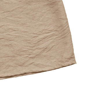 Detail shot of the khaki A-line skirt featuring pleated fabric texture and stitching