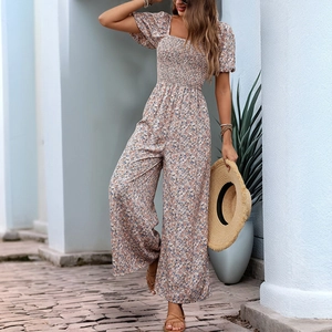 Floral square neck smocked jumpsuit with puff sleeves and wide legs for summer vacation