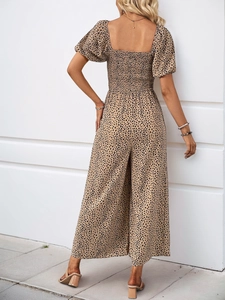 Detail of leopard print wide leg jumpsuit with back smocking and elegant square back cut
